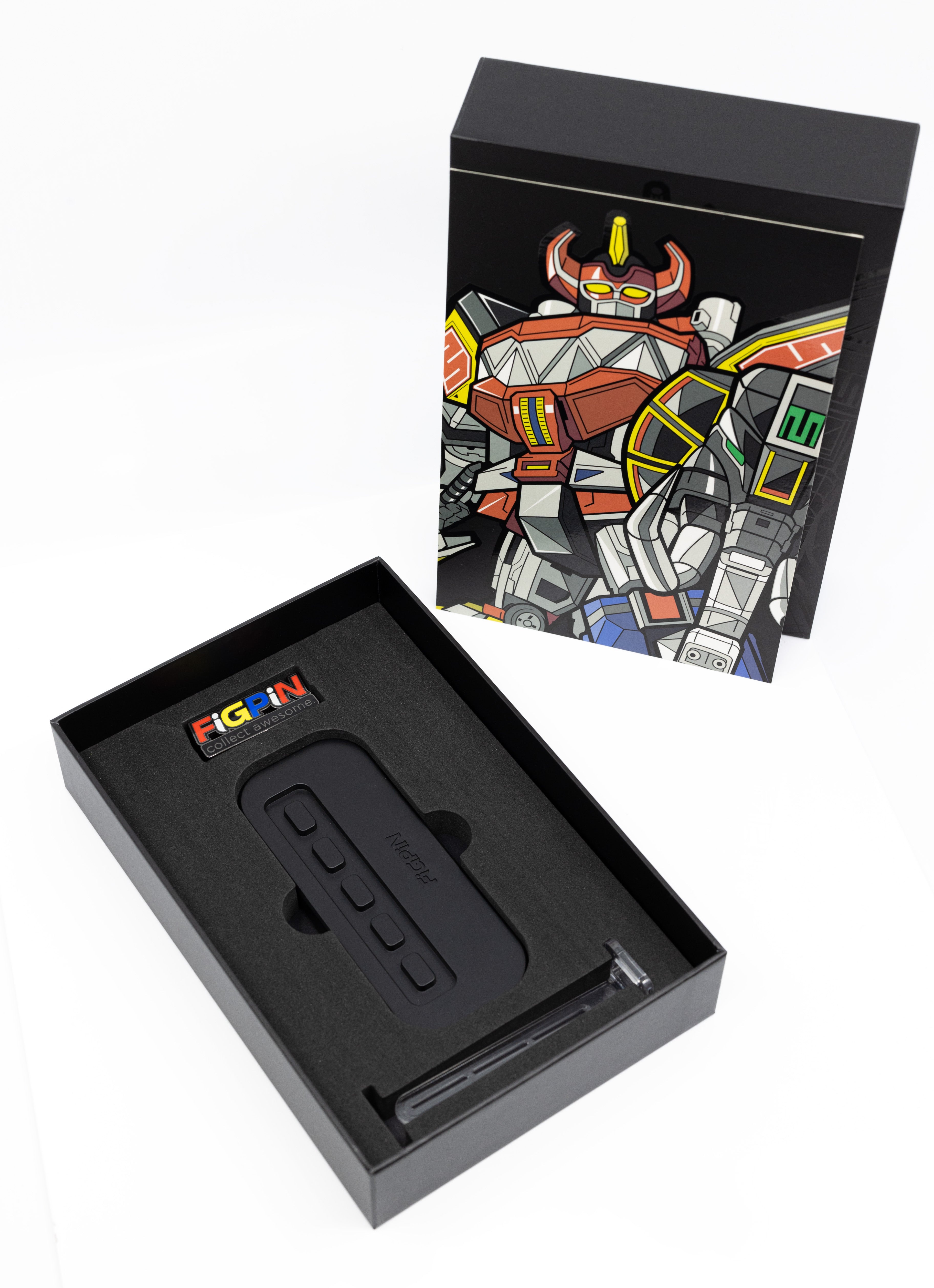 Power Rangers Megazord FiGPiN XL packaging and inside components including FiGPiN XL Logo enamel pin, Power Base Display, and 2 Action Posts.